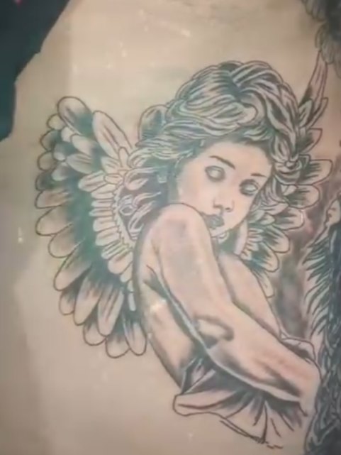 Angel linework tattoo by Skin Deep Tattoos