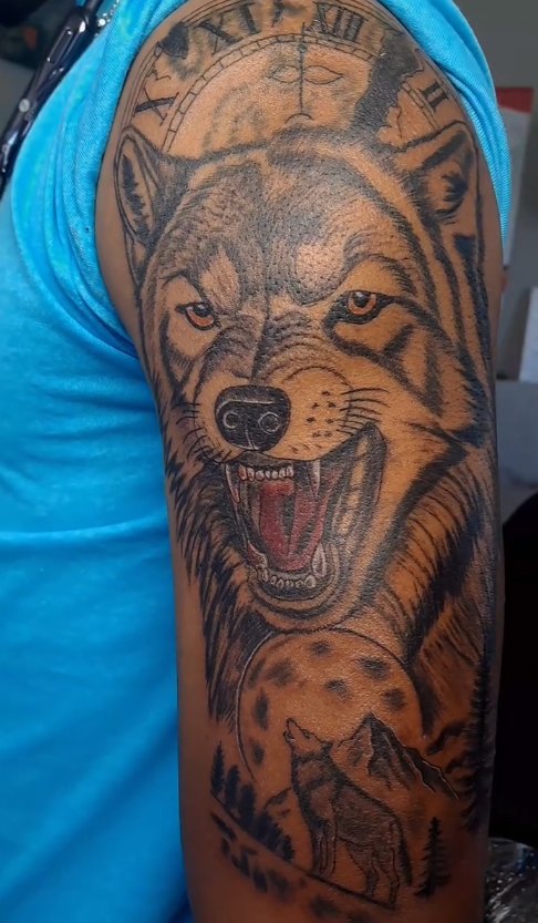 Wolf tattoo by Skin Deep Tattoos